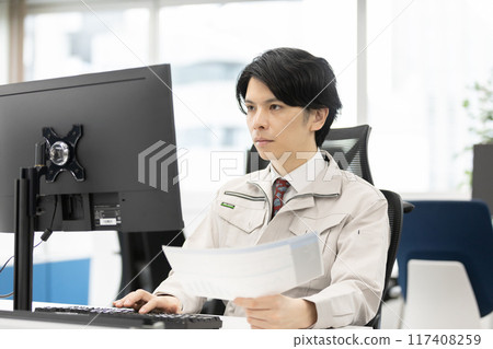 Man in work clothes designer developer image Man in work clothes designer developer image 117408259