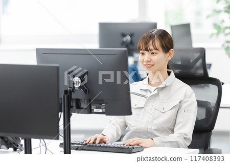 business woman working in work clothes business woman working in work clothes 117408393