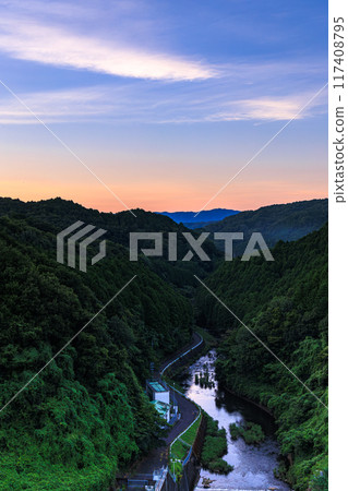 Summer 2024 Evening view of the north side of Nunome Dam (Nunome River) Nunome River reflecting the sunset sky② 117408795