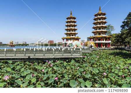 View of the lotus in bloom at the Dragon and Tiger Pagoda in Lotus Pond, Kaohsiung, Taiwan. 117409890
