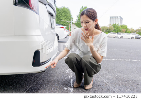 Young woman driving accident suicide rub scratching wound Young woman driving accident suicide rub scratching wound 117410225