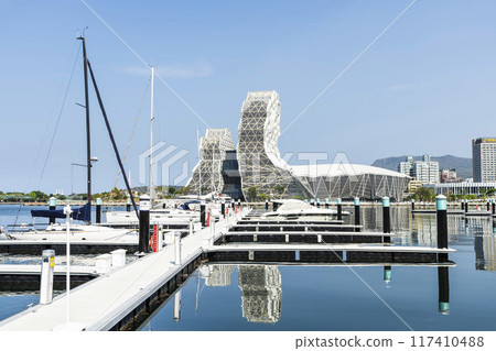 View of Yacht Marina at Glory Pier of Kaohsiung Port, Taiwan. with the Kaohsiung Music Center building. 117410488