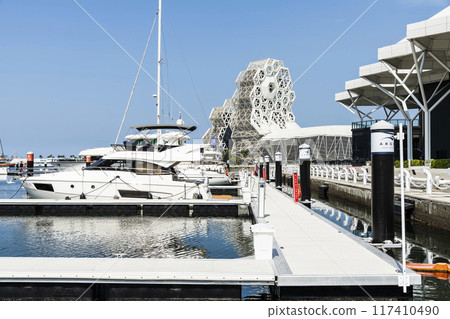 View of Yacht Marina at Glory Pier of Kaohsiung Port, Taiwan. with the Kaohsiung Music Center building. View of Yacht Marina at Glory Pier of Kaohsiung Port, Taiwan. with the Kaohsiung Music Center building. 117410490