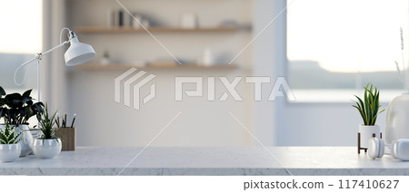 A copy space for displaying products on a white marble table in a minimalist white room. 117410627