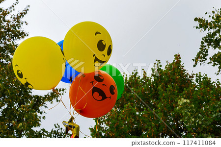 Multicolored balloons. Baby balloons against the sky Multicolored balloons. Baby balloons against the sky 117411084