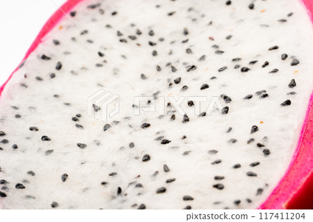 Close-up background of a cross section of dragon fruit 117411204