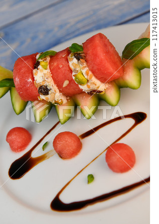 RECIPE OF SALAD OF FETA RINGS COATED WITH DRIED FRUIT, PISTACHE, NUTS AND PASTEQUE RECIPE OF SALAD OF FETA RINGS COATED WITH DRIED FRUIT, PISTACHE, NUTS AND PASTEQUE 117413015