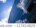 Clouds in the window of the building 117414829