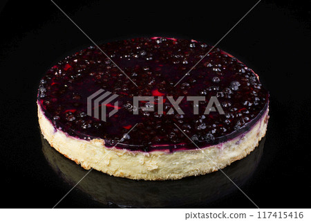 Cake cheesecake with cherry in jelly on black background 117415416