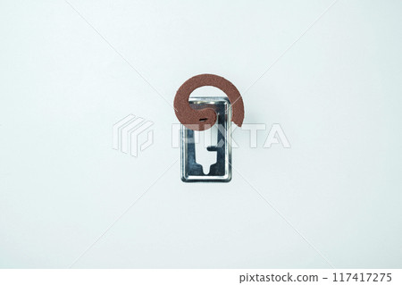 Mosquito coils with a silver object in the middle Mosquito coils with a silver object in the middle 117417275