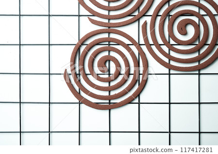 Mosquito coils with a brown center Mosquito coils with a brown center 117417281