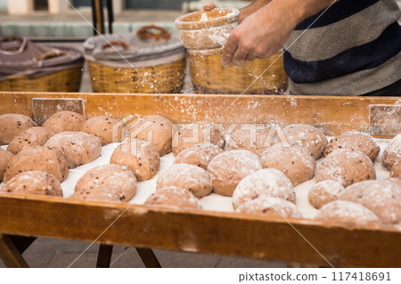 Bread preparation. loaves of dough before baking Bread preparation. loaves of dough before baking 117418691
