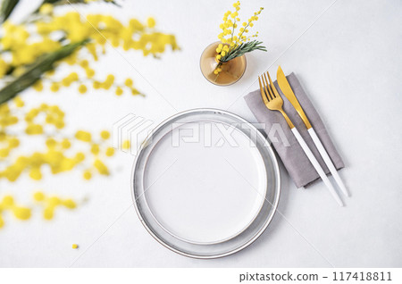 Festive table setting for the spring celebration of women's day, birthday or mother's day  117418811