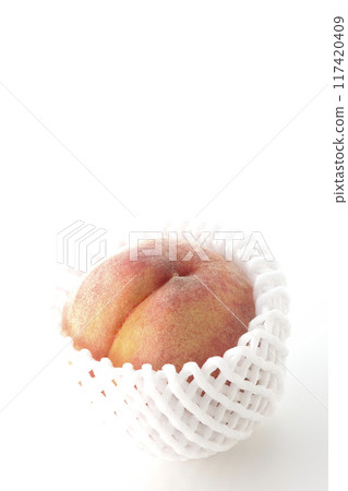 Peaches wrapped in cushioning material Peaches wrapped in cushioning material 117420409