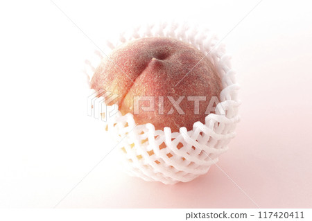 Peaches wrapped in cushioning material Peaches wrapped in cushioning material 117420411