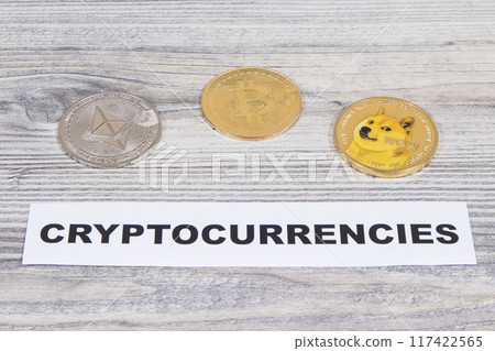 Coins and cryptocurrencies inscription. International network payment. Finance concept Coins and cryptocurrencies inscription. International network payment. Finance concept 117422565