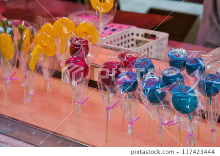 Colorful candy, candy apples, food stalls, summer vacation, gourmet food, fruit, skewers, festival Colorful candy, candy apples, food stalls, summer vacation, gourmet food, fruit, skewers, festival 117423444