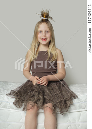 Pretty girl smiling and having fun at home, portrait Pretty girl smiling and having fun at home, portrait 117424341