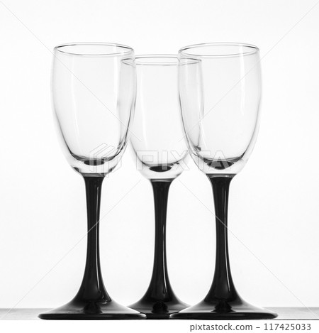 Three glasses of strong alcohol 117425033