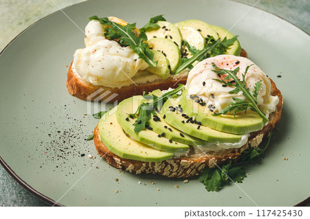 sandwich with cream cheese, sliced avocado and boiled egg, arugula, on grainy bread, homemade, breakfast, no people, 117425430