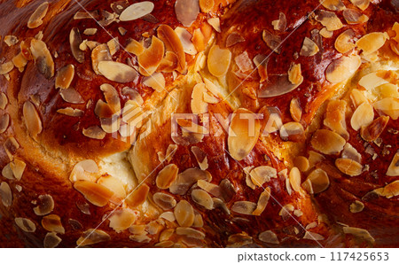 braided, sweet bread pie, with sliced almonds, close-up, breakfast, braided bread, brioche, top view, no people, braided, sweet bread pie, with sliced almonds, close-up, breakfast, braided bread, brioche, top view, no people, 117425653