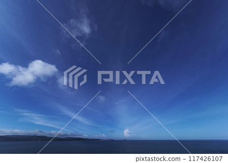 Rising cumulonimbus clouds and radially spreading cirrus clouds, summer, ultra-wide-angle, sky-focused, 240727am 117426107