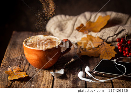 Cozy background with cup of coffee 117426186
