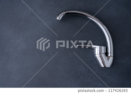 Chrome-plated mixer tap for water in the bathroom and kitchen. Plumbing. 117426265