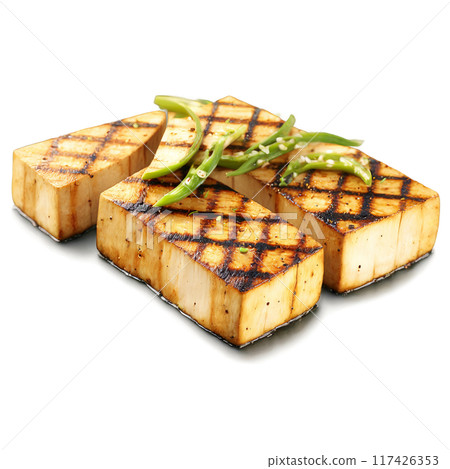 Grilled tofu steaks with grill marks and a sprinkle of chopped scallions Summer food concept Grilled tofu steaks with grill marks and a sprinkle of chopped scallions Summer food concept 117426353