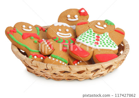 christmas gingerbread cookie in a wicker basket isolated on white background christmas gingerbread cookie in a wicker basket isolated on white background 117427862