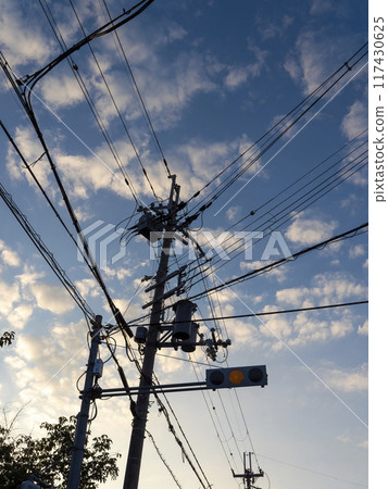 Early morning blue sky and electric poles seen from downtown Early morning blue sky and electric poles seen from downtown 117430625