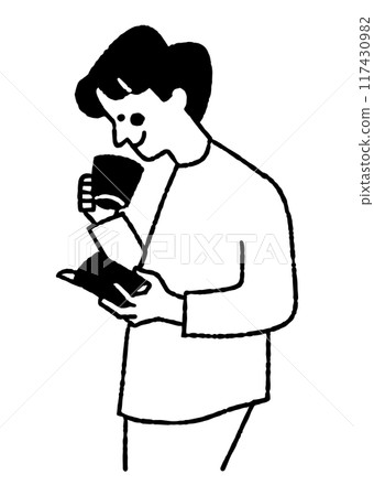 A man reading a book while drinking coffee_2 A man reading a book while drinking coffee_2 117430982