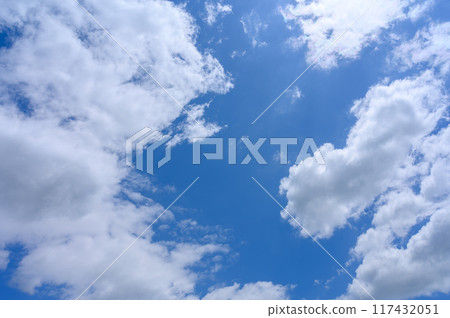 White clouds flowing in the early summer blue sky 117432051