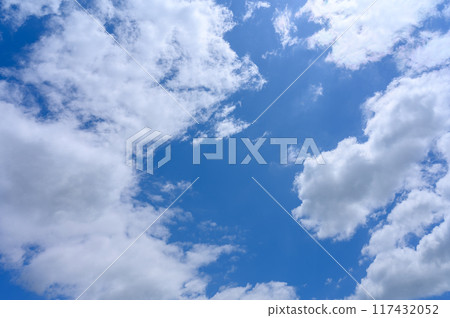 White clouds flowing in the early summer blue sky 117432052