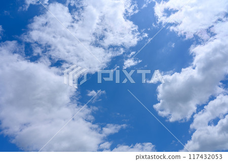 White clouds flowing in the early summer blue sky 117432053