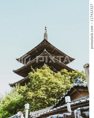 Five-storied pagoda shining in the blue sky Five-storied pagoda shining in the blue sky 117432327