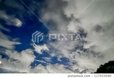 Dynamic clouds in the night sky 117433040