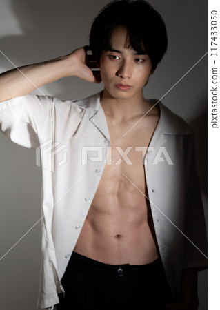 Young man with body makeup 117433050