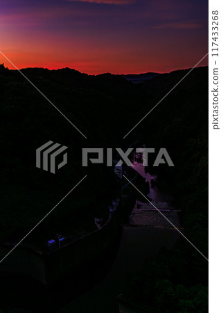 Summer 2024 Evening view of Nunome Dam in eastern Nara City North side of the dam (valley) Burning sky Deepening evening sky and sunset on the mountainside② 117433268