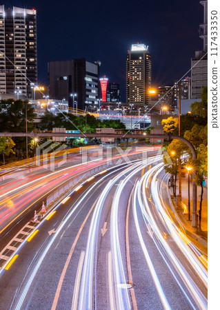 Light trails of cars running in the city at night 117433350