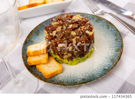 Tuna tartare appetizer served on platter Tuna tartare appetizer served on platter 117434365