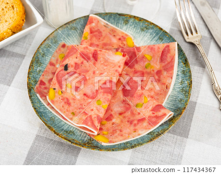 Cabeza, traditional spanish pork sausage on serving table close up 117434367