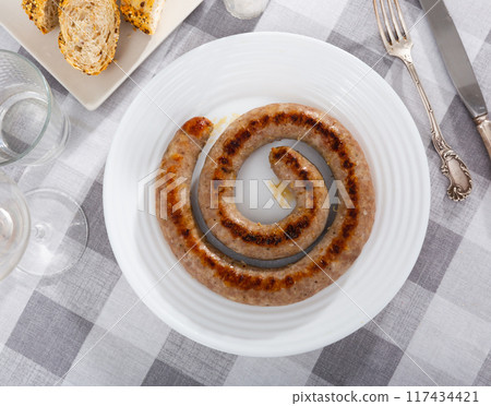 Fried pork sausage served on platter Fried pork sausage served on platter 117434421