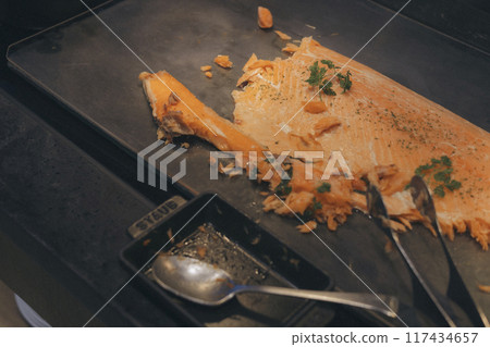Cooking salmon 117434657