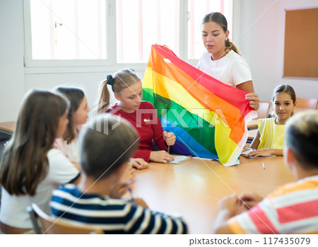 Female teacher discussing with children about LGBT movements in class 117435079