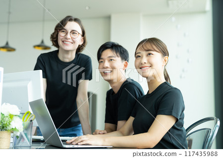 Young engineer working in the office Young engineer working in the office 117435988