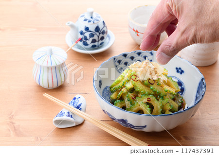 Fresh bitter melon boiled in soy sauce Fresh bitter melon boiled in soy sauce 117437391