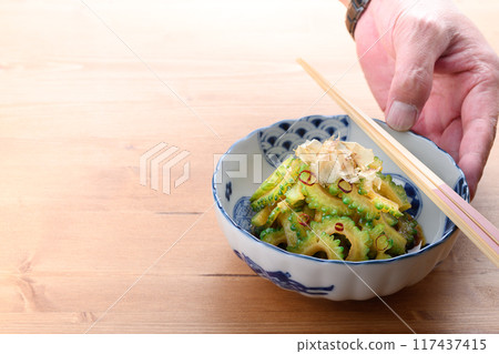 Fresh bitter melon boiled in soy sauce Fresh bitter melon boiled in soy sauce 117437415
