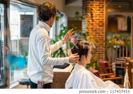 beautician, beauty artist, coiffeur 117437455