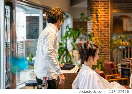 beautician, beauty artist, coiffeur 117437456